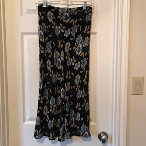 Beautiful long black skirt with blue flowers